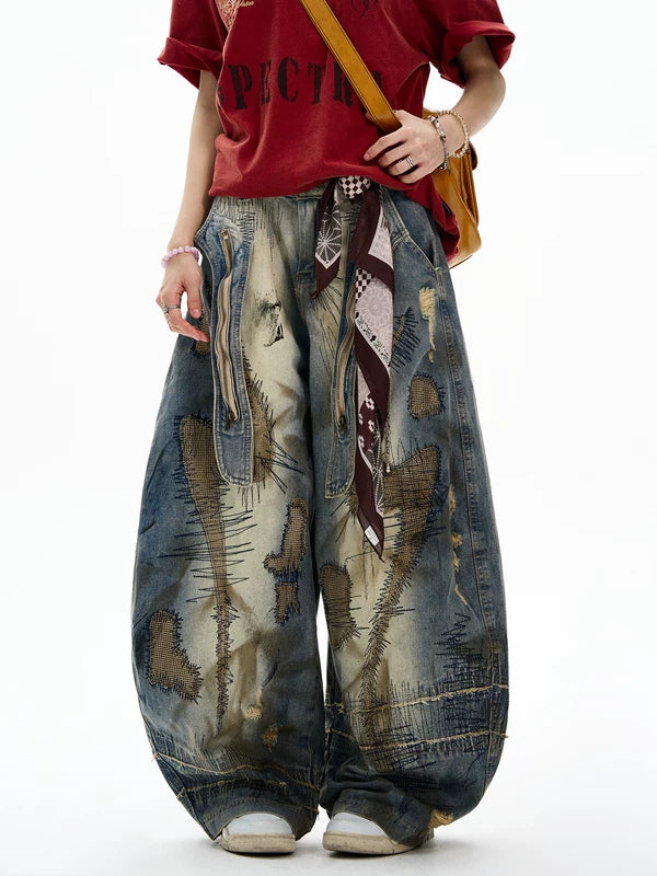 Calças de Denim Largas em Patches Desgastados 